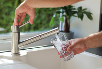 Filling a glass from a tap